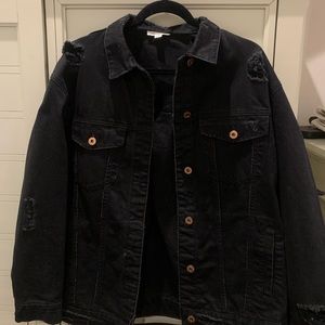 Black distressed oversized denim jacket.